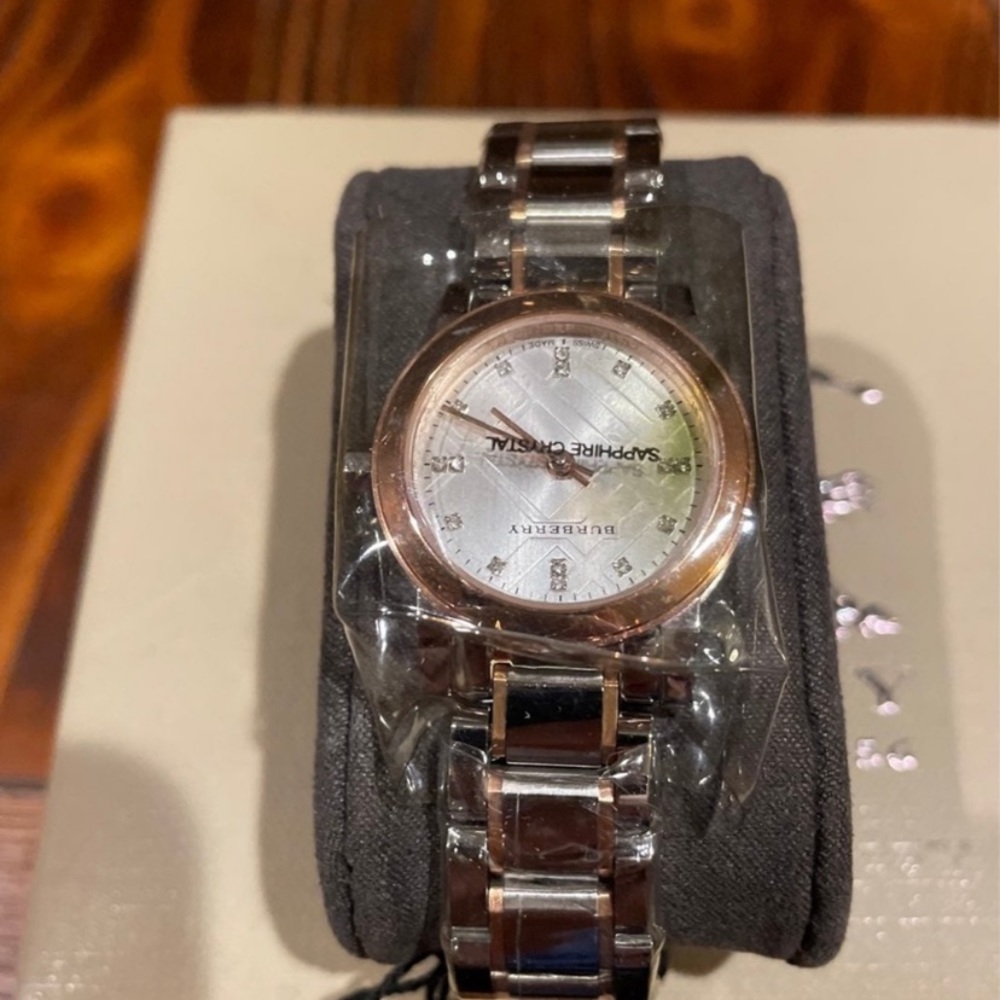 Burberry brand new watch with tags .
